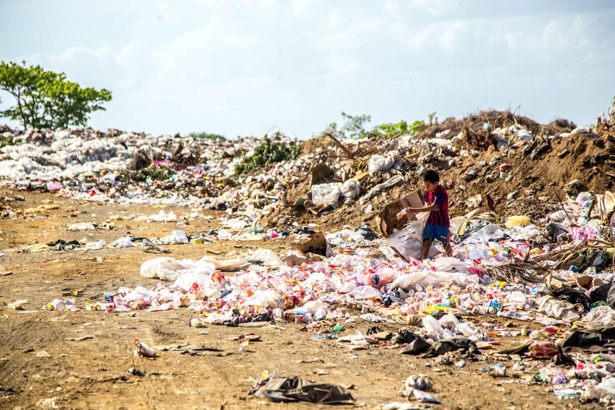 Due to the less regulation in the countries where the plastic reaches and due to a lack of resources - sometimes the plastic is not recycled there at all. Photo by Hermes Rivera on Unsplash