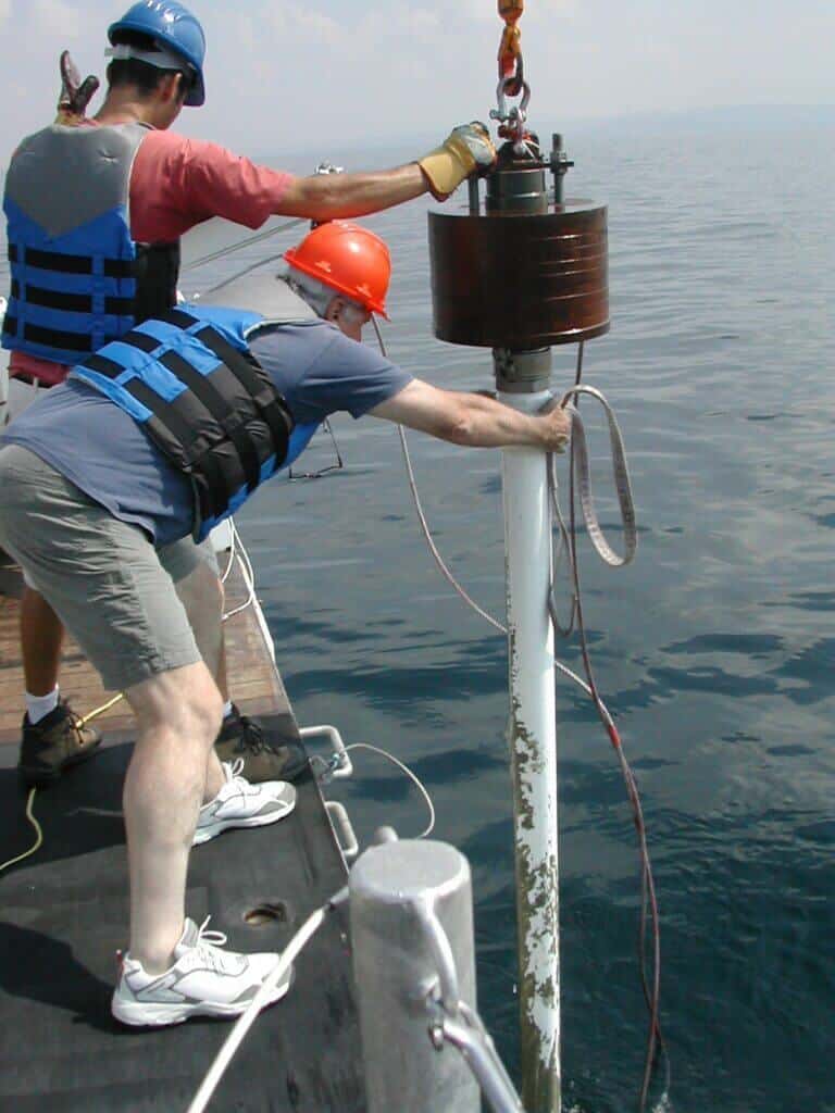 The researchers extract a mud sample from the seabed west of Haifa on board the Mediterranean Explorer research ship belonging to the EcoOcean association