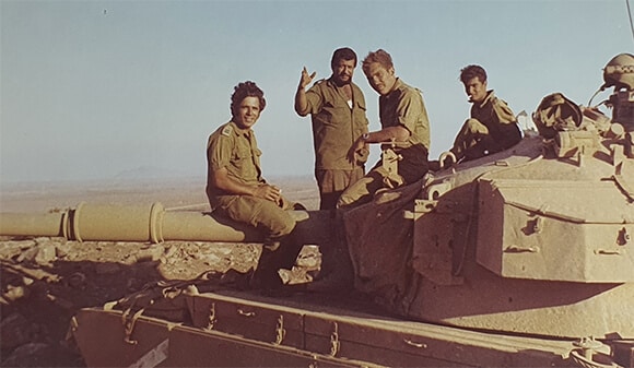 Insisted on returning to service. Wahlberg (left) with a tank crew in reserve training Photo courtesy of the Wahlberg family