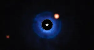 Astronomers have used the James Webb Space Telescope to detect a planet of similar mass to Saturn around the young star TWA 7. In this image, which combines data from the VLT ground-based telescope and Webb's MIRI instrument, the star's light has been removed. The location of the star is marked by a circle with an asterisk in the center. The blue area indicates the disk around the star (SPHERE data), and the orange area indicates the MIRI data. The bright orange spot at the top right is TWA 7 b. The orange spot on the far left is an unrelated background star. Credit: NASA, ESA, CSA, Anne-Marie Lagrange (CNRS, UGA), Mahdi Zamani (ESA/Webb)