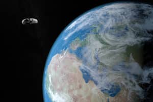 A small asteroid passes by Earth. Illustration: depositphotos.com